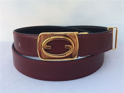 GG Milano leather belt in burgundy .